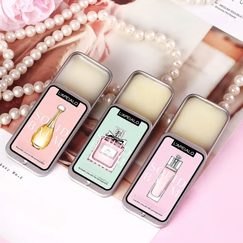 NNETM Portable Pocket Balm Solid Travel Perfume Men Women in elegant containers with perfume graphics.