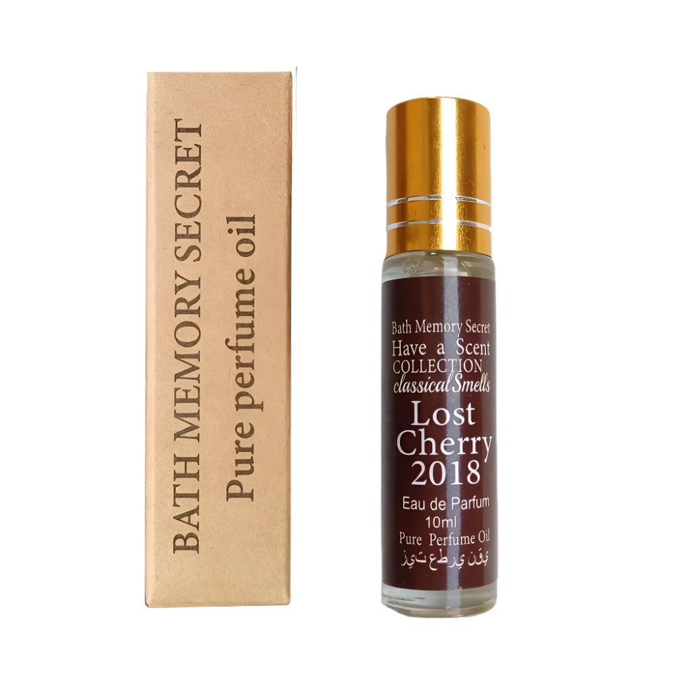 NNETM Long-Lasting Lost Roll-On Perfume Oil for Women alongside Lost Cherry 2018 packaging and bottle.
