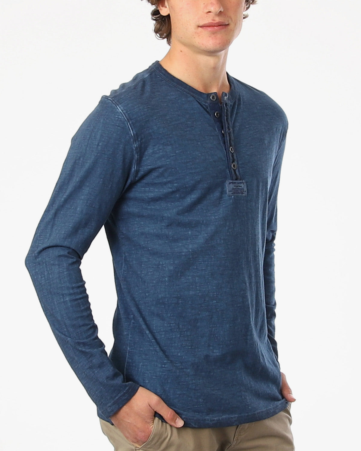 ZIMEGO Mens Long Sleeve Crew Neck Oil Wash Vintage Button Henley T-Shirt in blue color worn by a male model.