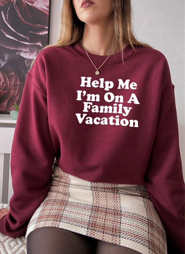 Model wearing Help Me Im On A Sweat Shirt in burgundy, showcasing stylish digital print and cozy design.