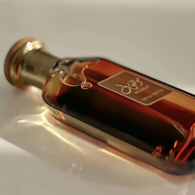 Arabian Musk Perfume Long-Lasting Woody Fragrance in an elegant glass bottle with a golden cap.