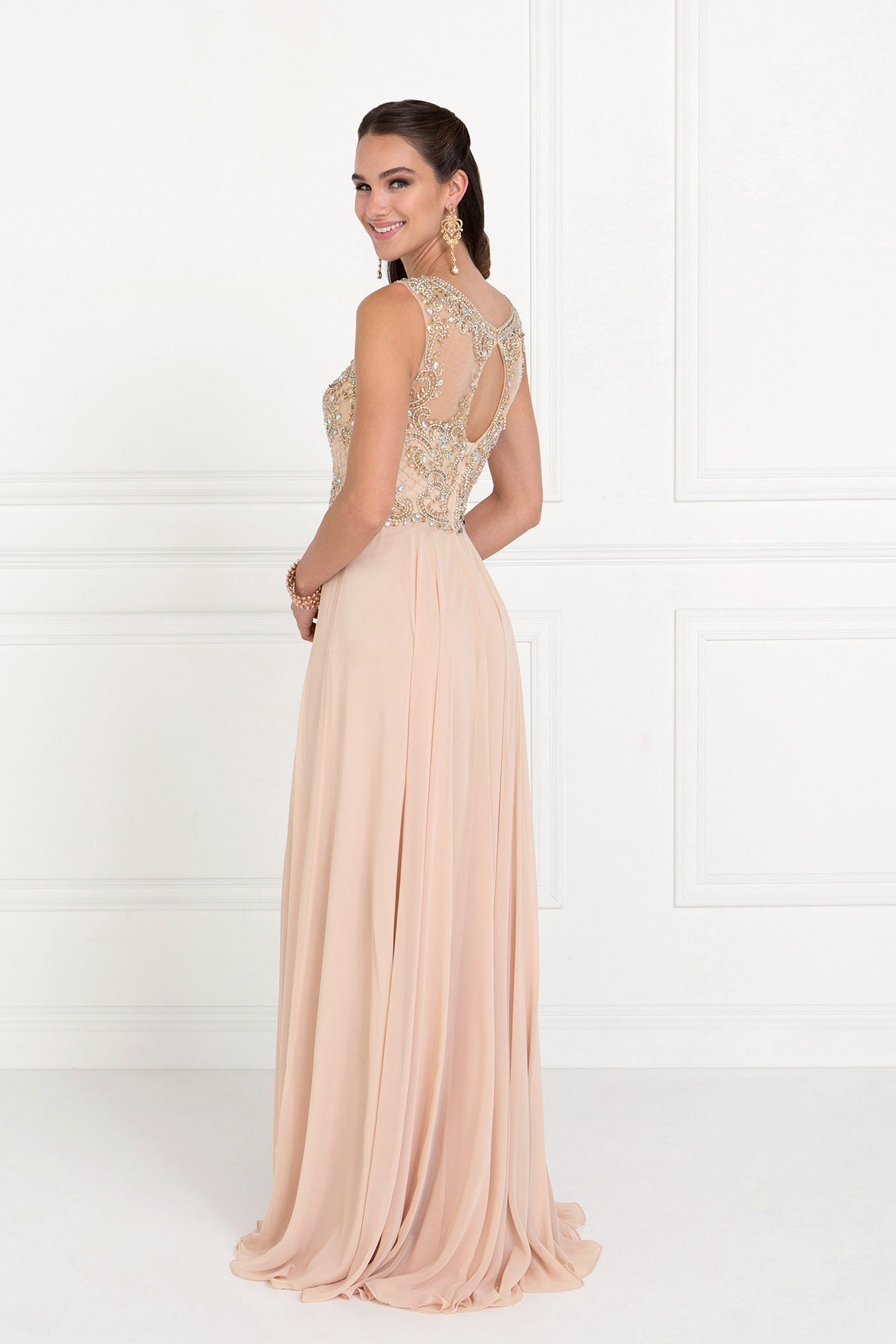Chiffon Sweetheart A-Line prom dress showcasing elegant back with beaded detailing and flowing skirt in soft pink.