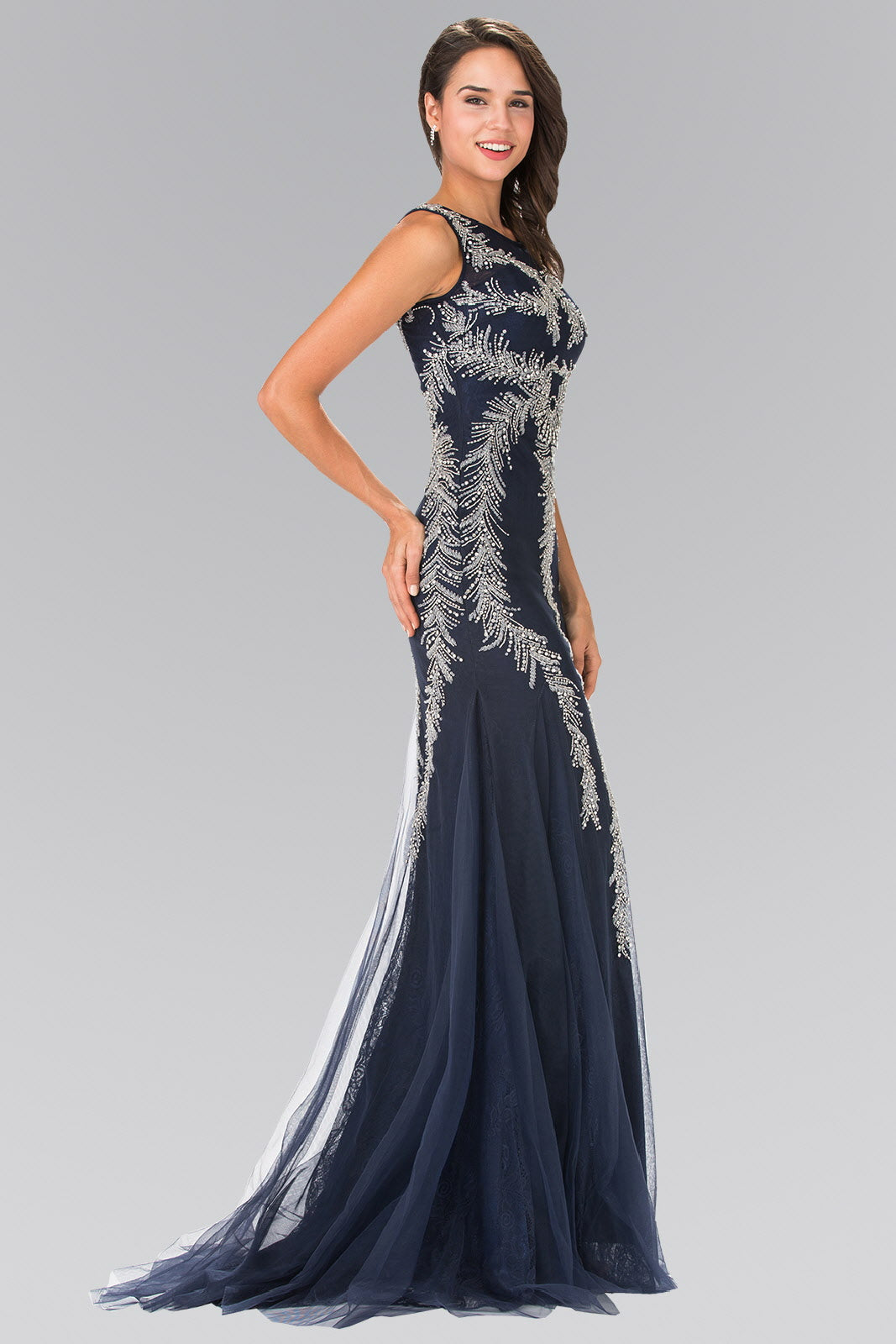 Beaded Lace Mermaid Dress With a sleeveless, boat-neck design modeled in navy color with intricate detailing.