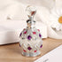NNETM Luxury Dubai Floral Perfume Oil for Women in elegant jeweled glass bottle.