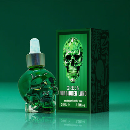 Forbidden Land Perfume Oil for Men in a green skull-shaped bottle with packaging, 30ml liquid fragrance.