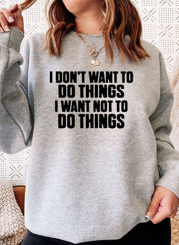 I Dont Want To Do Things Sweat Shirt worn by a woman, showcasing stylish and cozy design in grey.