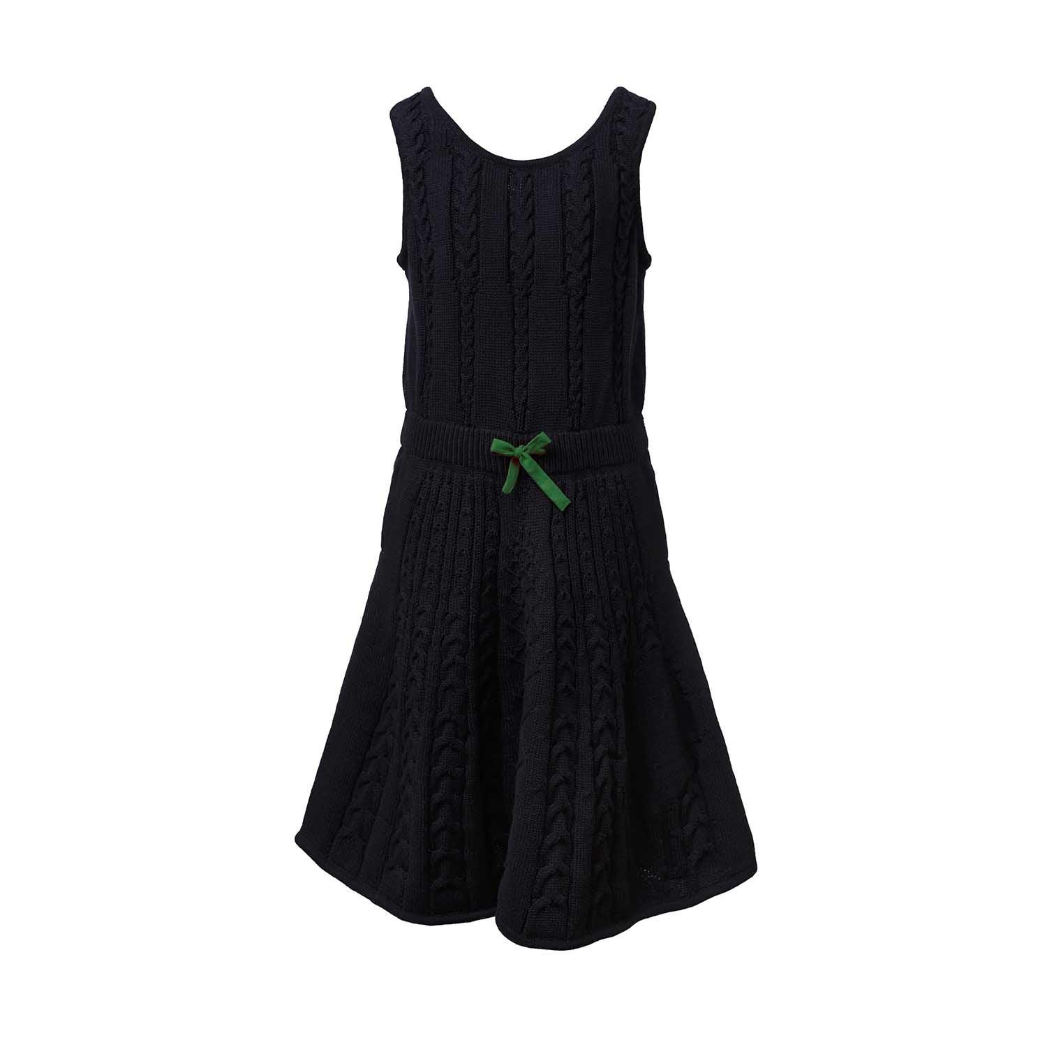 Black Cable Knit Dress for Girls featuring intricate cable knit patterns and a green bow detail.
