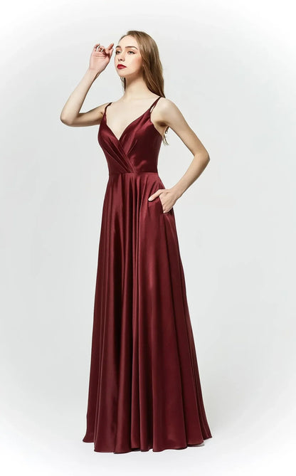 J19025 V-neck ball gown in rich berry hue with pockets and A-line silhouette