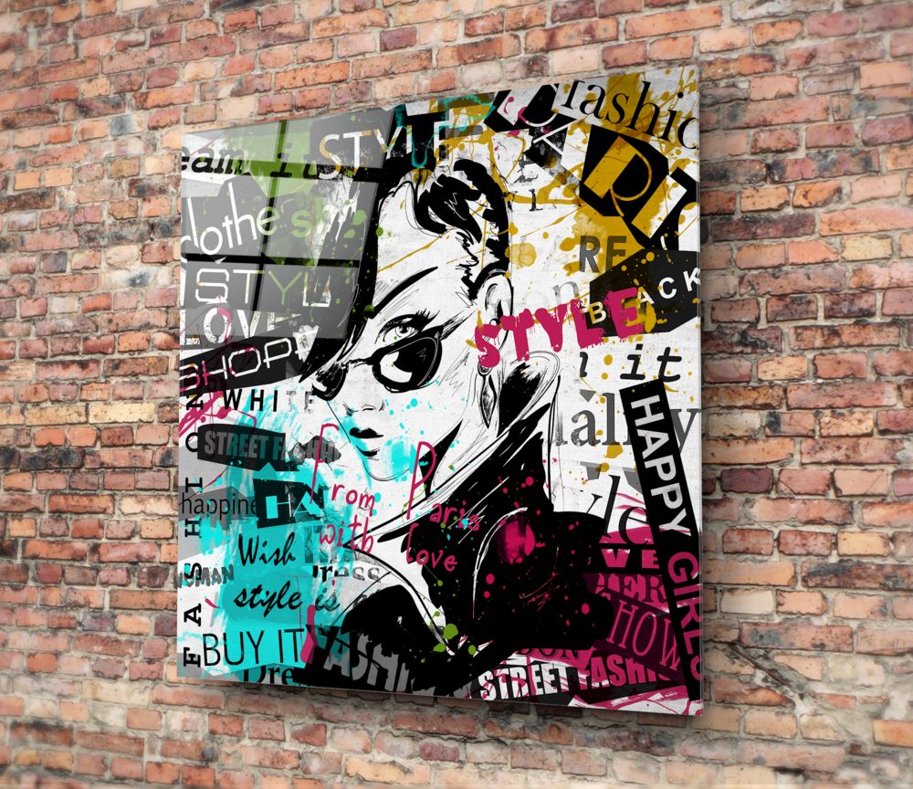 Fashion Glass Wall Art featuring vibrant colors and stylish graphics on a textured brick background.
