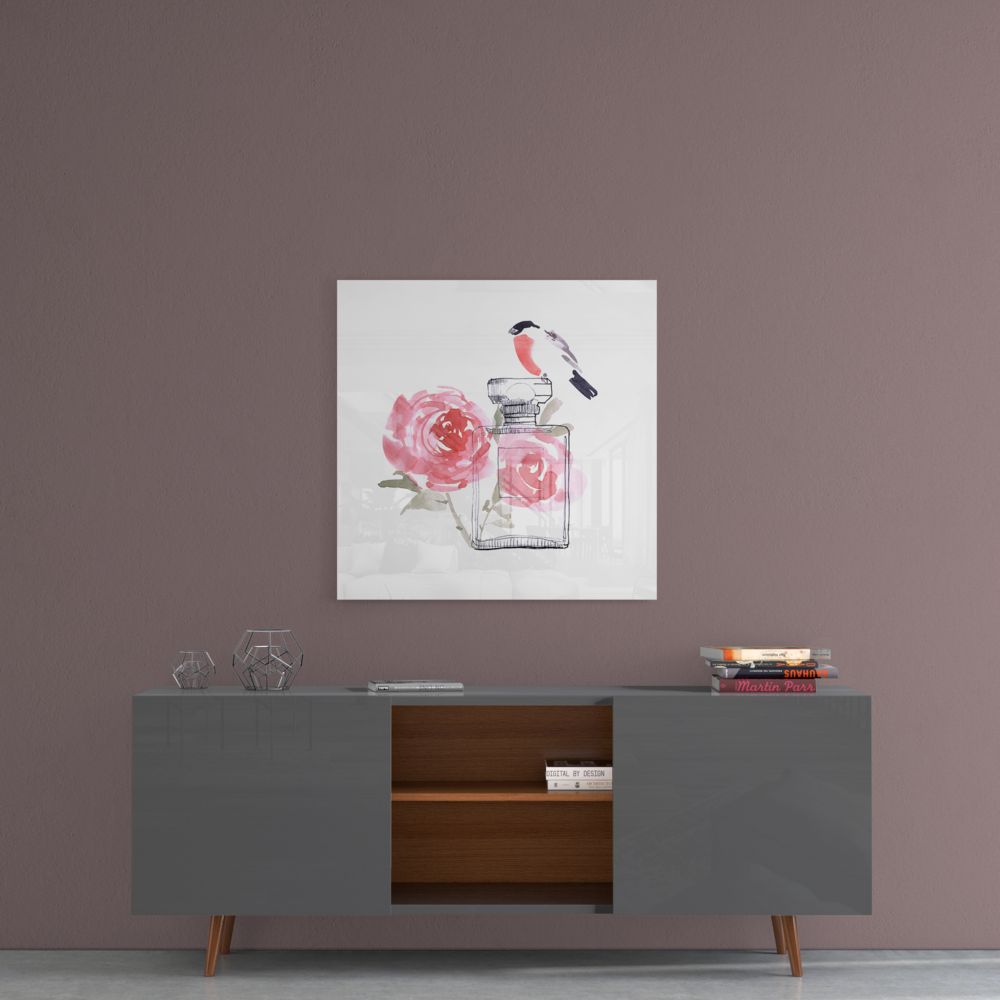 Perfume Glass Wall Art featuring a pink rose and a bird, elegantly displayed on a wall above a modern cabinet.