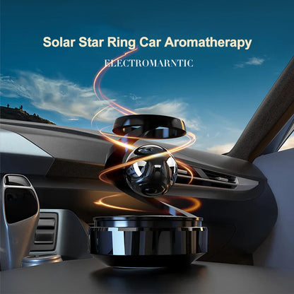 Solar-Powered Rotating Car Air Freshener–Suspension Perfume Diffuser Black displayed in a car interior with aromatic features.