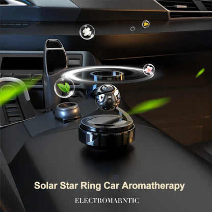 Solar-Powered Rotating Car Air Freshener–Suspension Perfume Diffuser Black in a car interior with aromatherapy features.