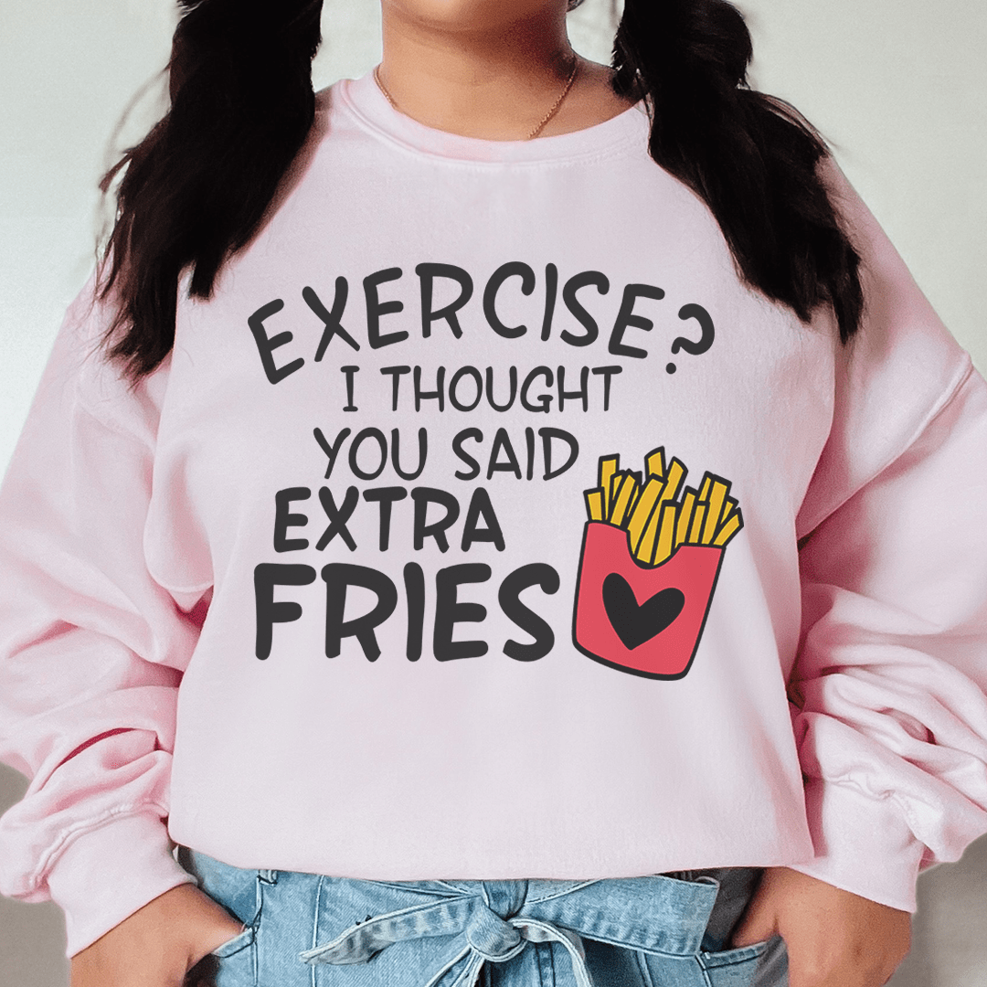 Exercise I Thought You Said Extra Fries sweatshirt on a model with black pigtails, cozy and stylish.