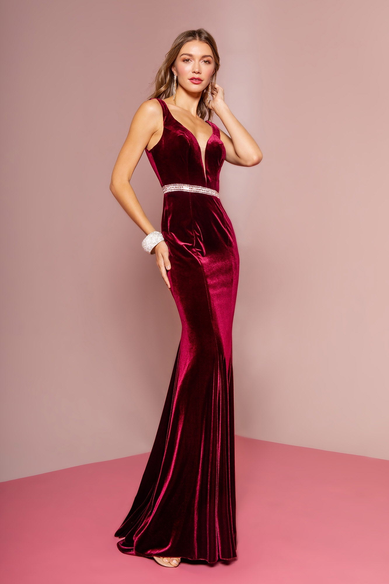 Jewel Accented Waist Line V-Neck Velvet Dress w/ U-Back in burgundy with a mermaid silhouette and jewel embellishments.