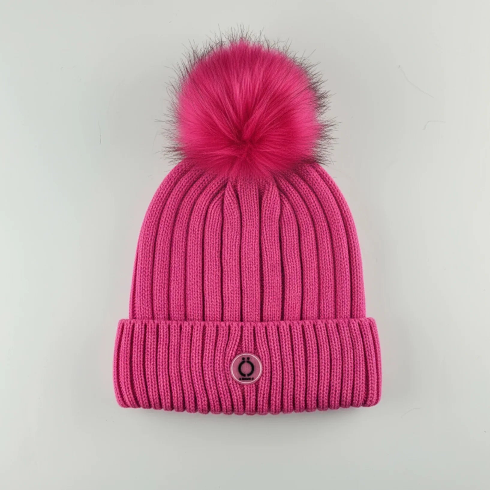 Fushia Tuque with soft long fur pompom and polar fleece lining, featuring a removable pompom for color options.