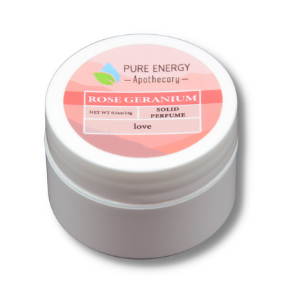 Solid Perfume .50oz - Rose Geranium in a white container with pink label highlighting love.